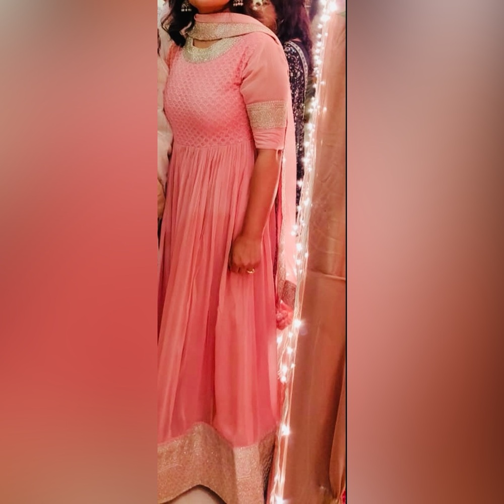 Dreamy Peach-Pink Anarkali Gown with Shimmering Silver Accents